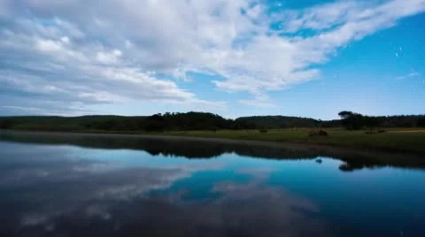Reflection of clouds on scenic lake Stock Footage 54268707