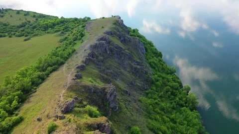 Reflection of Clouds on the Surface of Pchelina Dam Stock Footage 318678750
