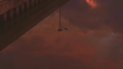 Reflection of Clouds in Water at Dusk Stock Footage 311843193