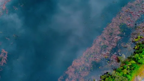 REFLECTION OF CLOUDS ON WATER Stock Footage 230995815