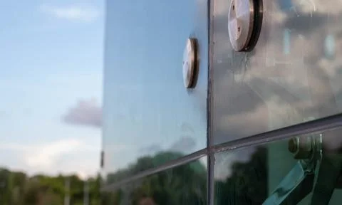 Reflection of clouds in window glass Stock Photos