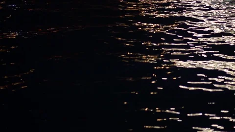 Reflection of colored lights of ships on the water surface. Glare, round boke Video stock 88237400