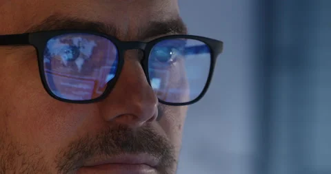 Reflection of computer screen data on programmer glasses Stock Footage 185330360