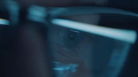 Reflection of computer screen in man's glasses Video stock 336740629