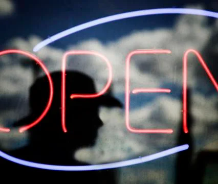 Reflection of a Cowboy in a Bar Window Stock Photos