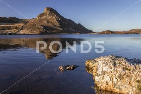 Reflection in Cregennan Lakes, Snowdonia, Wales Stock Photos