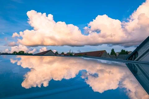 Reflection of cumulus clouds in a skylight Stock Photos
