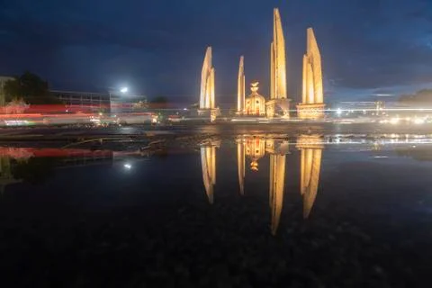 Reflection of Democracy Monument at twilight time at Bangkok,Thailand Stock Photos