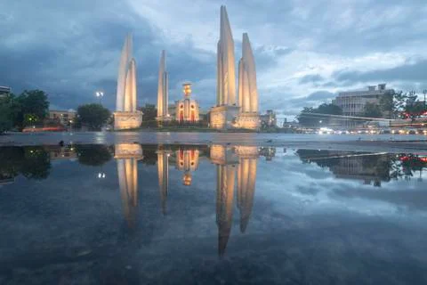 Reflection of Democracy Monument at twilight time at Bangkok,Thailand Stock Photos