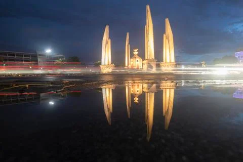 Reflection of Democracy Monument at twilight time at Bangkok,Thailand Stock Photos