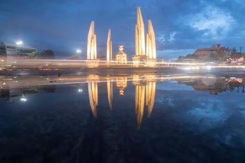 Reflection of Democracy Monument at twilight time at Bangkok,Thailand Stock Photos