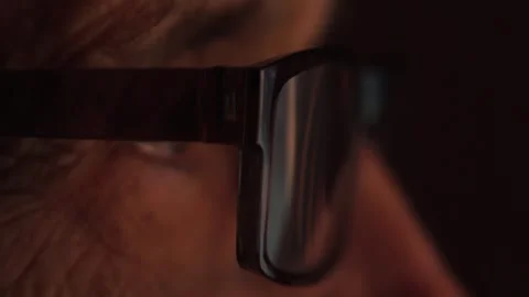 Reflection of digital content in glasses of old man Stock Footage 304847436
