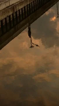 Reflection of Dock and Sky in Water 스톡 사진