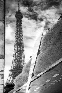 A reflection of Eiffel tower view from the street of Paris, France. Stock Photos