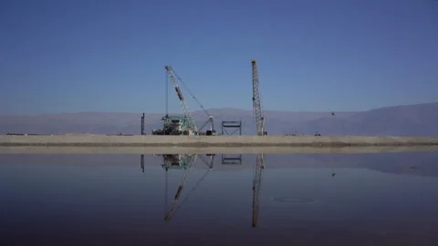 Reflection on an evaporation pond, Dead Sea Israel/Palestine Stock Footage 230106157