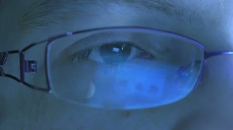 Reflection in the eye and glasses Stock Footage 62651712