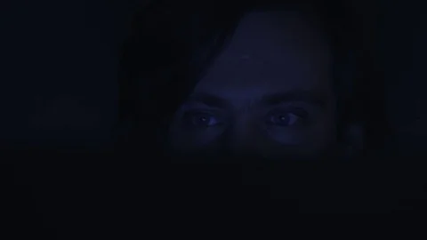 Reflection at eyeglasses of man: looking at a website work on laptop close up Stock Footage 83277865