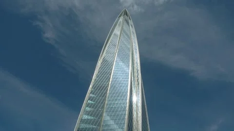 Reflection Of Fast Clouds On A Glass Building Video stock 331080949