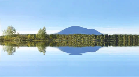 Reflection of forest and mountains in lake Stock Footage 49052523