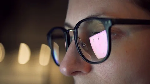 Reflection Girl In Glasses Looking On Computer Monitor.Overtime Work On Laptop Stock Footage 124576715