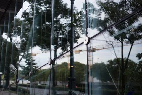 Reflection in the glass of the building facade Stock Photos