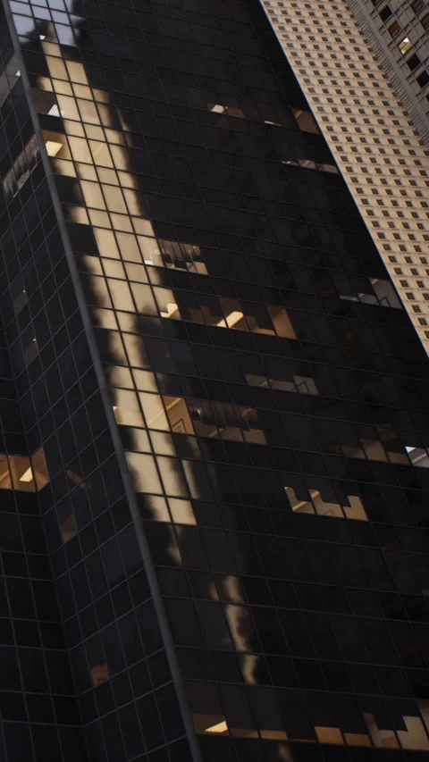 Reflection on the glass building showcasing urban landscape and city life Stock Footage 341239565