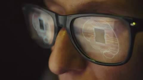 In the reflection of glasses on a female face, surfing the Internet and a symbol Stock Footage 270245555