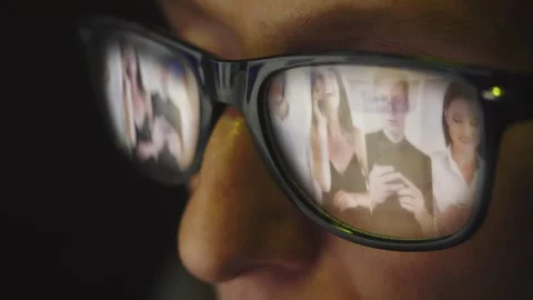 In the reflection of glasses on a female face there is a search page on the Stock Footage 269140128