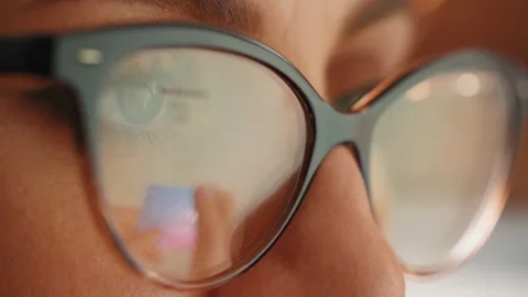 Reflection in glasses of the female hands and credit card. Stock Footage 179050482