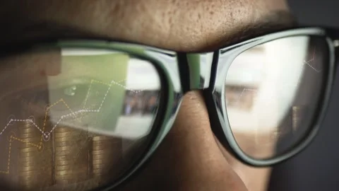 In the reflection of glasses on a man's face, surfing the Internet and growing Stock Footage 270245013