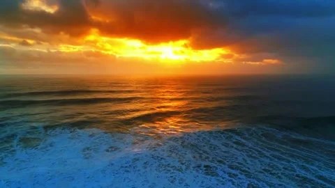 Reflection of golden light of rising sun in ocean water. Sunset or sunrise over  Stock Footage 277210520