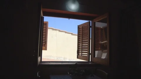 Reflection of hands closing the window shutter Stock Footage 86751205