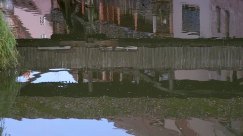 Reflection of Hangmans Bridge in the River Pegnitz Stock Footage 262545096