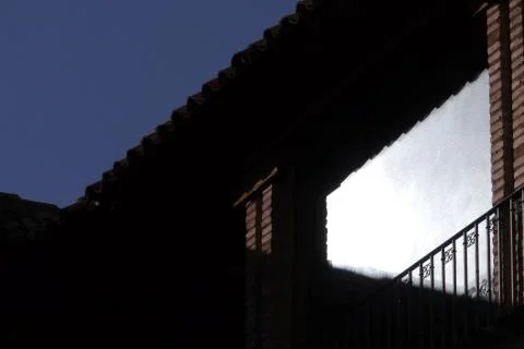 Reflection of hard light in one of the upper windows Stock Photos