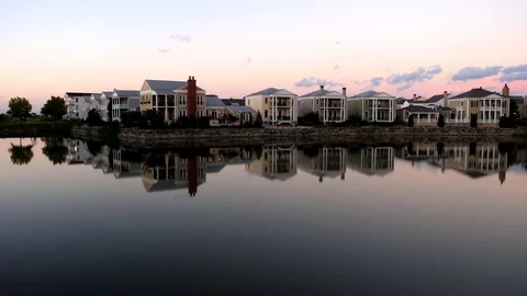 Reflection of Houses on the Lake Stock Footage 79438814