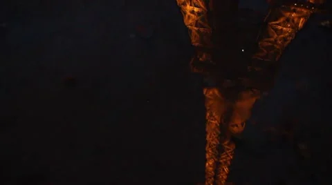 Reflection of the illuminated Eifel Tower in a puddle at night 動画素材 63458920