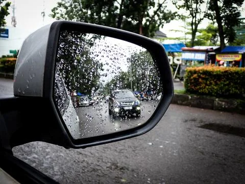Reflection of the image from the car rearview mirror Stock Photos