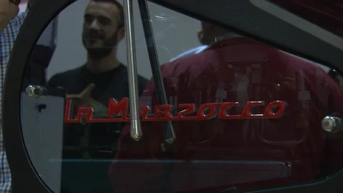 Reflection on La Marzocco | espresso machines handmade in florence since 1927 Stock Footage 87063792