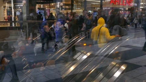 Reflection of layers of crowd of people in rush hour using escalator to commute Stock Footage 127266415