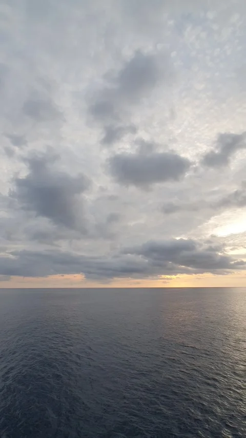 Reflection of light between clouds, sky and sea Stock Footage 297409334