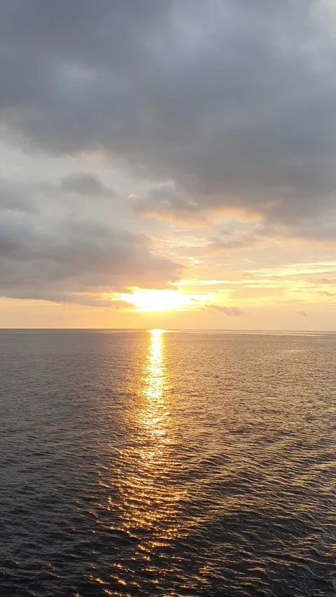 Reflection of light between clouds, sky and sea Stock Footage 297409335