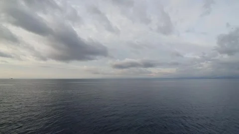 Reflection of light between clouds, sky and sea Stock Footage 297418739