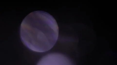 Reflection of light from a crystal prism shines in the dark Stock Footage 309231050