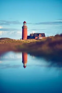 Reflection of a Lighthouse at the danish coast Stock Photos