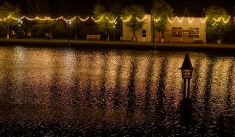 The reflection of lights in the night on the river 스톡 사진