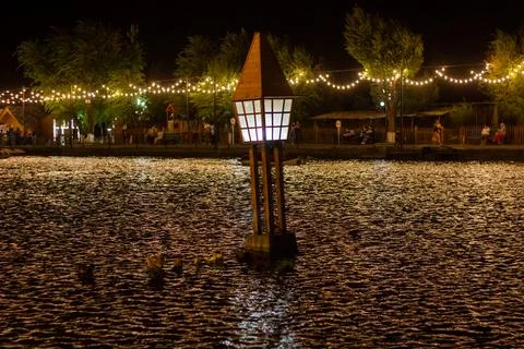 The reflection of lights in the night on the river Stock Photos