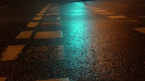 Reflection of lights trafic on wet roads 4K Stock Footage 82979175
