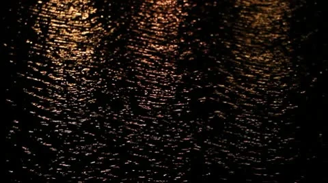Reflection of lights on water Stock Footage 10576950