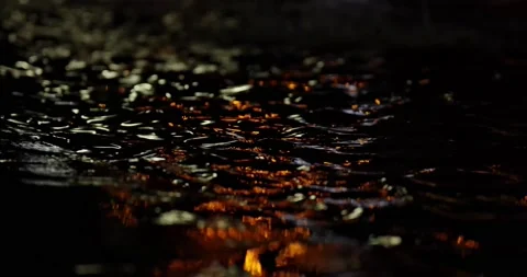 Reflection of Lights on the Water Surface at Night. Stock Footage 155657175