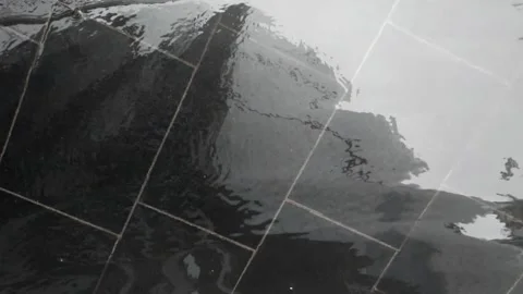 Reflection of london buildings in puddle Stock Footage 135179210